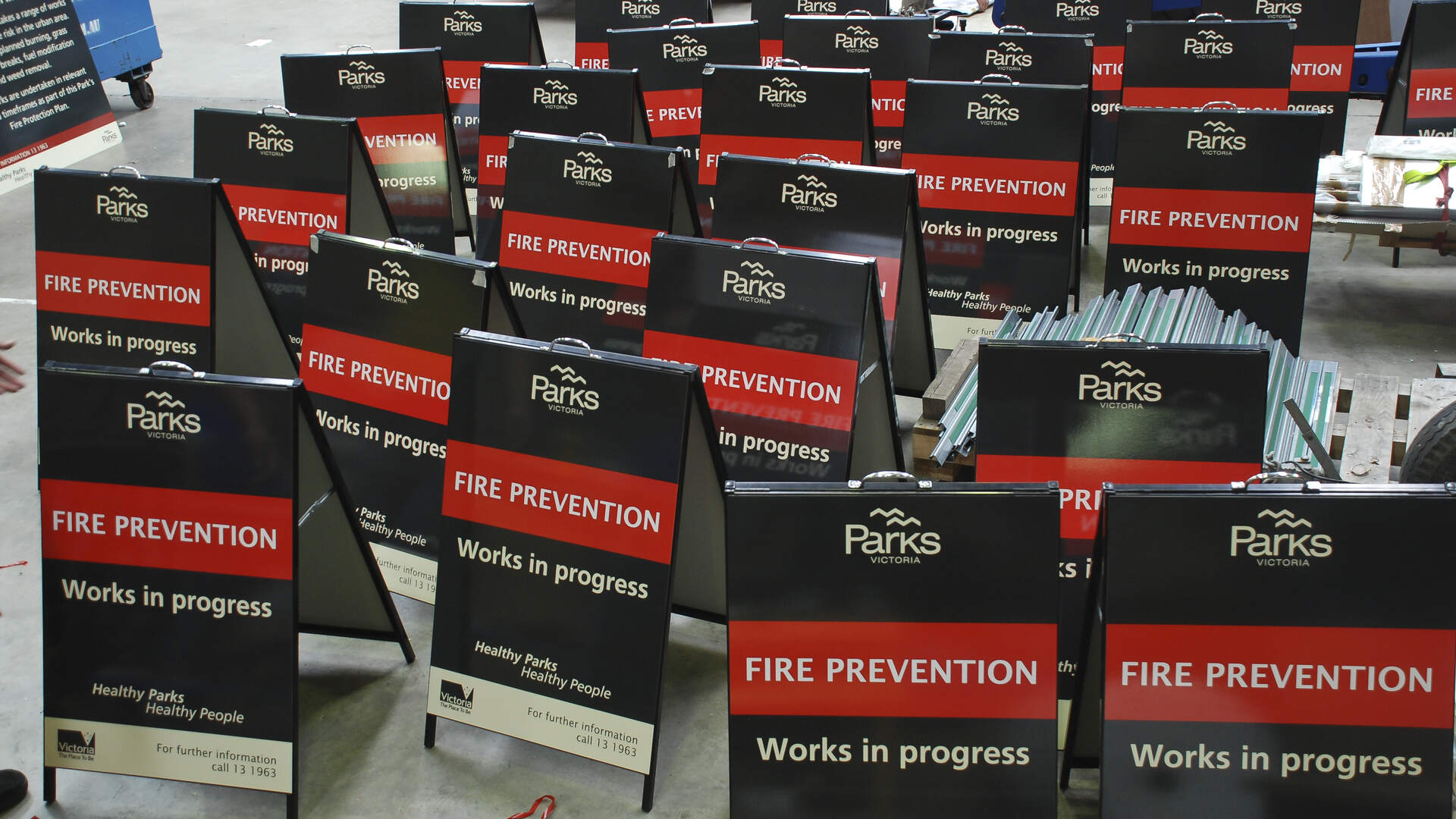 Multiple 'Parks Fire Prevention' A frame signs displayed at Form A Sign's factory
