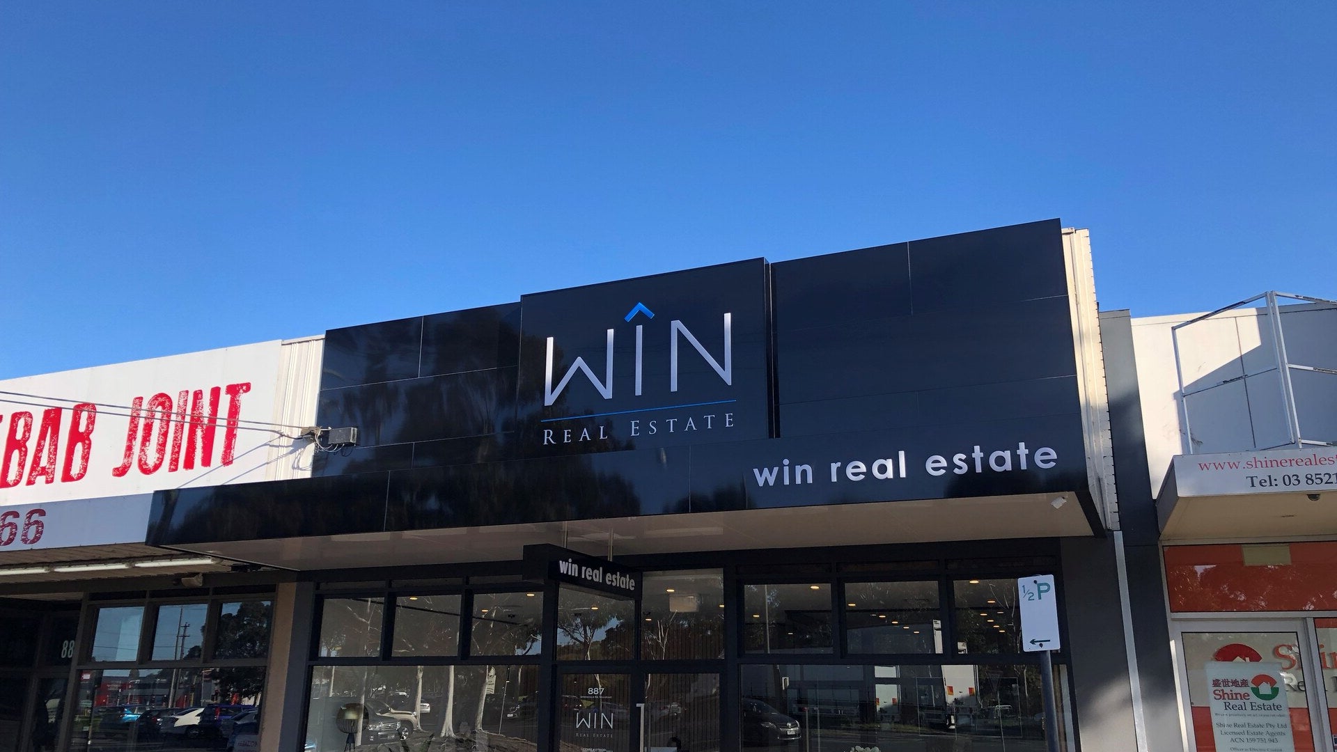 Real estate façade sign and facia sign and lightbox sign