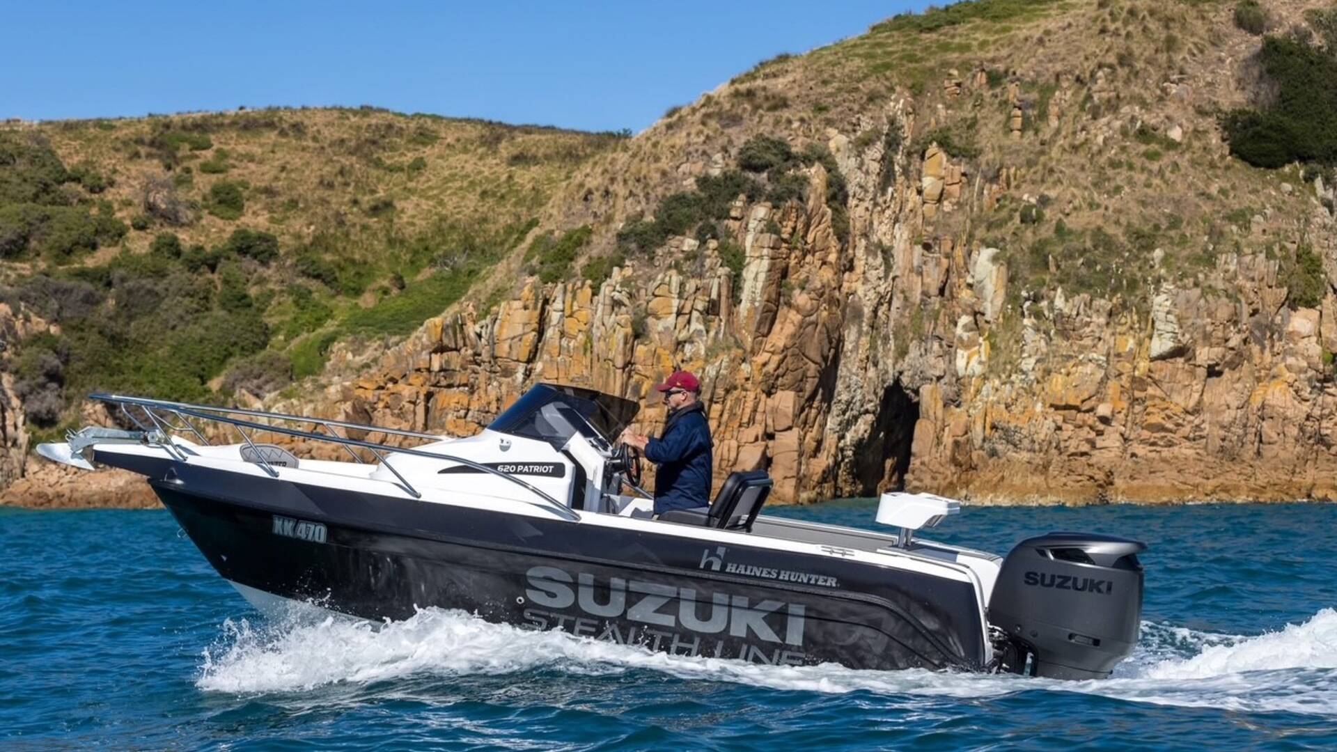 Custom fishing boat wrap Melbourne Victoria Suzuki Marine Boat Wrap 3M vinyl Stealth Line