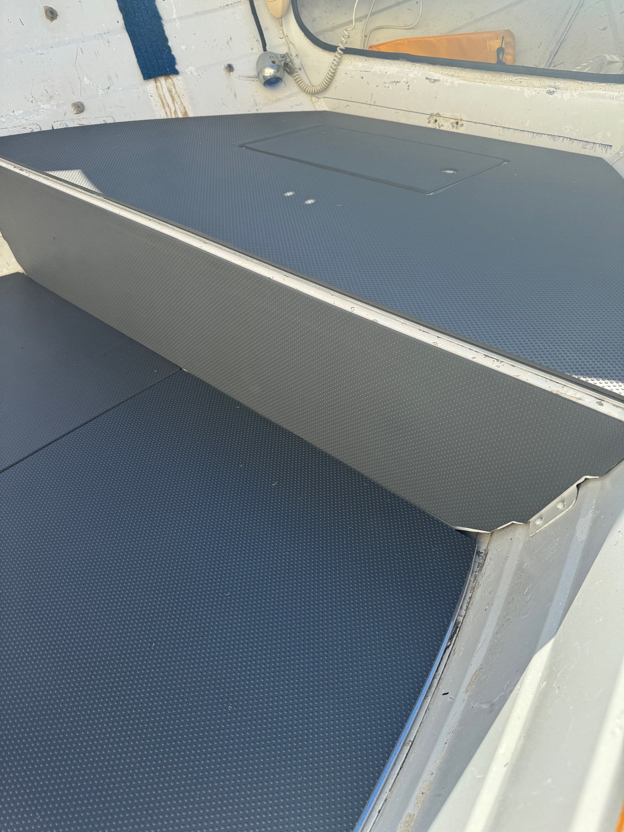 See the premium dimpled texture and cushioned feel of our 5mm nano steel grey or dark grey UDEK EVA foam boat flooring in action. Designed for comfort, grip, and durability, this marine-grade material delivers a clean, modern finish while standing up to harsh marine conditions.